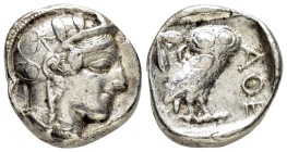 ATTICA.Athens.(Circa 454-404 BC).Tetradrachm.

Obv : Helmeted head of Athena right.

Rev : AΘE.
Owl standing right, head facing; olive sprig and ...