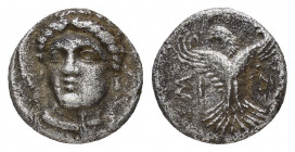 PAPHLAGONIA.Sinope.(Circa 330-250 BC).Trihemiobol.

Obv : Head of Sinope facing slightly left.

Rev : ΣΙ - ΝΩ.
Eagle facing, head left, with wings spr...