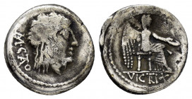M. CATO.(89 BC).Rome.Quinarius.

Obv : M CATO.
Head of Liber right, wearing ivy-wreath.

Rev : VICTRIX.
Victory seated right, holding patera and palm ...