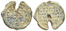 BYZANTINE LEAD SEAL.(Circa 10th Century).Pb.

Obv : A patriarchal cross mounted on a base of three steps. Fleurons on either side.Border of dots.

Rev...