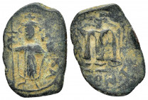 ARAB-BYZANTINE.Pseudo Byzantine Type.Imitating the Types of Constans II.(Circa 647-670).Fals.

Obv : Emperor standing facing, holding long cross and g...