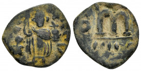 ARAB-BYZANTINE. Early Caliphate.(636-660).Fals. 

Obv : Crowned emperor standing facing, holding long cross and globus cruciger.

Rev : Large M, blund...