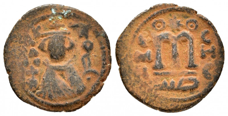 ARAB-BYZANTINE. Early Caliphate.(636-660).Fals. 

Obv : Crowned emperor standing...