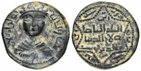 ARTUQID of MARDIN.Husam al-Din Yuluq Arslan.(1184-1200).AH 582.Dirhem.

Obv : Diademed and draped facing bust, with hand across chest; legend around.
...
