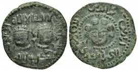 ARTUQID of MARDIN.Nasir al-Din Artuq Arslan. (1200-1239).AH 606.Mardin.Dirhem. 

Obv : Male figure seated side-saddle on leopard left; circular legend...