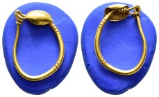 ROMAN GOLD EARRING.(3rd-4th century).Gold.

Condition : Good very fine.

Weight : 1.37 gr
Diameter : 14 mm
