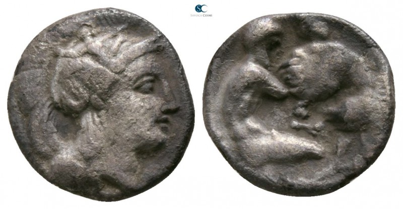 Calabria. Tarentum circa 450-380 BC. 
Diobol AR

10mm., 1,01g.

Head of Ath...