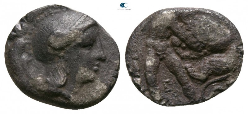 Calabria. Tarentum circa 380-325 BC. 
Diobol AR

10mm., 1,00g.

Helmeted he...