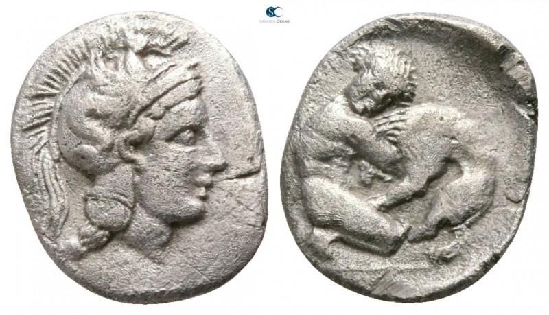 Calabria. Tarentum circa 325-280 BC. 
Diobol AR

10mm., 1,15g.

Helmeted he...