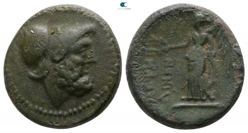 Bruttium. Petelia circa 216-204 BC. 
Onkia Æ

13mm., 3,93g.

Head of Ares r...