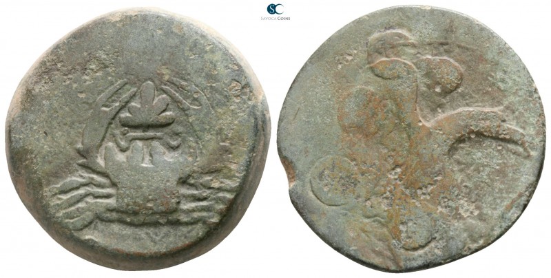 Sicily. Akragas circa 420-406 BC. 
Hemilitron Æ

23mm., 13,94g.

Crab, leaf...