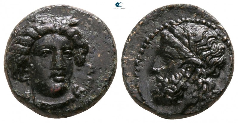 Sicily. Gela circa 339-310 BC. 
Bronze Æ

12mm., 3,00g.

Head of Demeter fa...