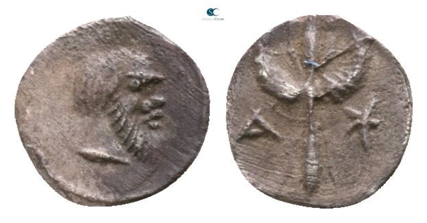Sicily. Katane circa 450 BC. 
Hexas AR

4mm., 0,08g.

Head of Silenos right...