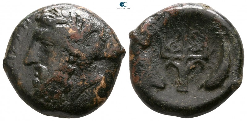 Sicily. Messana circa 338-275 BC. 
Litra Æ

18mm., 7,01g.

ΠΟΣΕΙΔΑΝ, laurea...