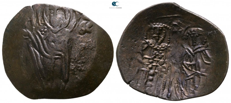 Michael VIII Palaeologus AD 1261-1282. Constantinople
Trachy Æ

22mm., 1,70g....