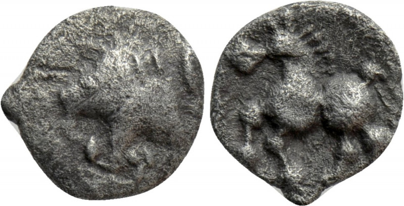 CENTRAL EUROPE. Boii. Obol (1st century BC). 

Obv: Stylized head left.
Rev: ...