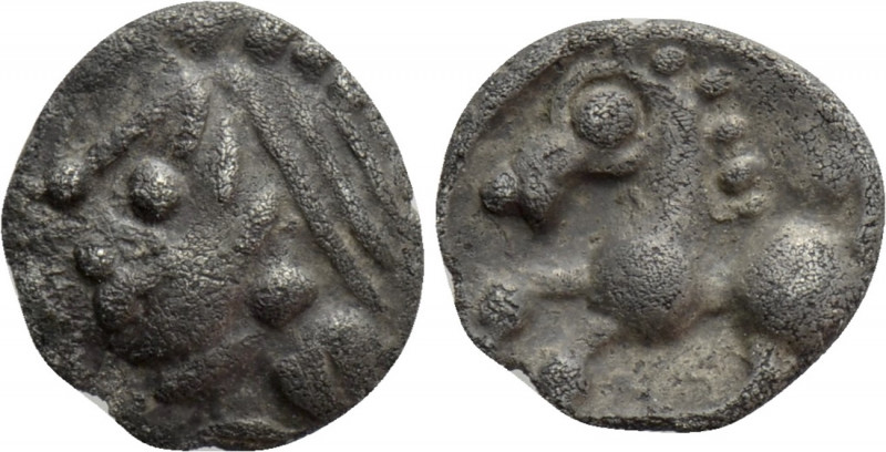 CENTRAL EUROPE. Boii. Obol (1st century BC). 

Obv: Head left.
Rev: Horse pra...