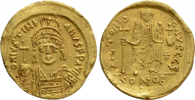 JUSTINIAN I (527-565). GOLD Solidus. Constantinople. 

Obv: D N IVSTINIANVS P ...