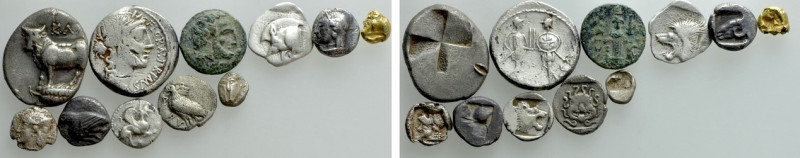 11 Greek and Roman Coins. 

Obv: .
Rev: .

. 

Condition: See picture.
...