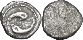 Greek Italy. Etruria, Populonia. AR Obol (?), 3rd century BC. Obv. Two dolphins. Dotted border. Rev. Blank. Vecchi EC 122 ; HN Italy 231 (Uncertain Mi...
