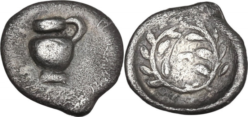 Greek Italy. Southern Apulia, Tarentum. AR Hemiobol, c. 450-380 BC. Obv. One-han...
