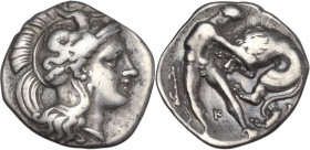Greek Italy. Southern Apulia, Tarentum. AR Diobol, c. 380-325 BC. Obv. Helmeted head of Athena right, helmet decorated with Scylla hurling stone. Rev....