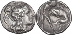 Greek Italy. Southern Apulia, Tarentum. AR Diobol, c. 380-325 BC. Obv. Helmeted head of Athena right, helmet decorated with hippocamp. Rev. TA. Herakl...