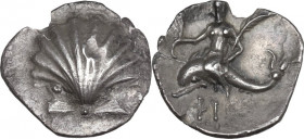 Greek Italy. Southern Apulia, Tarentum. AR Obol, c. 280-228 BC. Obv. Cockle shell. Rev. Phalanthos, nude, holding cornucopiae and palm branch, riding ...
