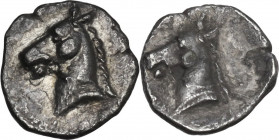 Greek Italy. Southern Apulia, Tarentum. AR 3/4 Obol, 325-280 BC. Obv. Head of horse left. Rev. Head of horse left. HN Italy 981; SNG Cop. 1063 (Hemili...