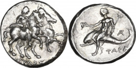 Greek Italy. Southern Apulia, Tarentum. AR Nomos, c. 272-240 BC. Reduced standard. Obv. The Dioskouroi riding right; [Ν]ΙΚΥΛΟΣ below. Rev. Phalanthos ...