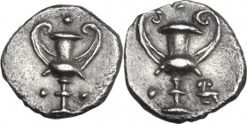Greek Italy. Southern Apulia, Tarentum. AR Obol, c. 280-228 BC. Obv. Kantharos; around, three pellets. Rev. Kantharos; around, two pellets; to lower r...