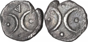 Greek Italy. Southern Apulia, Tarentum. AR Hemiobol, c. 280-228 BC. Obv. Two crescents back-to-back; four pellets around. Rev. Two crescents back-to-b...