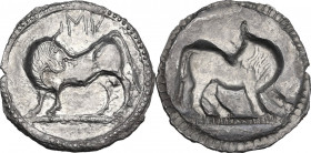 Greek Italy. Southern Lucania, Sybaris. AR Nomos, c. 550-510 BC. Obv. Bull standing left, with head reverted; above MV. Rev. The same type incuse righ...