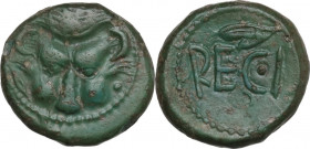 Greek Italy. Bruttium, Rhegion. AE Onkia, c. third quarter of 5th century BC. Obv. Lion's mask; to left, barley grain; to right, pellet. Rev. REC•I; a...