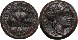 Greek Italy. Bruttium, Rhegion. AE 20 mm, c. 350-281 BC. Obv. Facing lion-mask with pointed ears. Rev. PHΓINON. Head of Apollo right; behind, wreath. ...