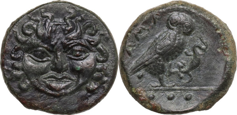Sicily. Kamarina. AE Tetras, c. 420-410 BC. Obv. Gorgoneion with wild locks. Rev...
