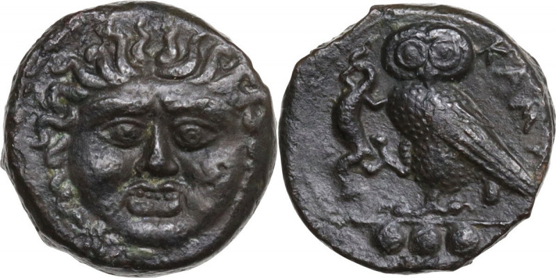 Sicily. Kamarina. AE Tetras or Trionkion, c. 420-410 BC. Obv. Gorgoneion facing,...