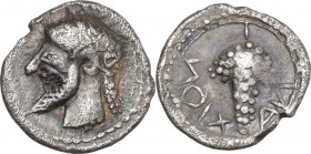 Sicily. Naxos. AR Litra, c. 530-510 BC. Obv. Bearded head of Dionysos left, wreathed with ivy. NAXION retrograde. Bunch of grapes. HGC 2 967; Cahn 12–...