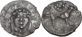 Sicily. Segesta. AR Litra, c. 455/0-445/0 BC. Obv. ΣΕΓΕΣΤΑΖΙΒ. Facing head of the nymph Segesta. Rev. Hound standing right; wheel of four spokes above...