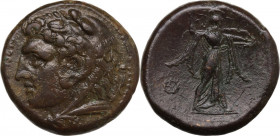 Sicily. Syracuse. Pyrrhos (278-276 BC). AE 24 mm. c. 278-276 BC. Obv. ΣΥΡΑΚΟΣΙΩΝ. Head of young Herakles in lion skin headdress left; behind, cornucop...
