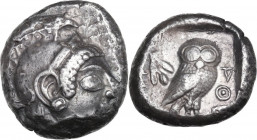 Continental Greece. Attica, Athens. AR Tetradrachm, c. 500-480 BC. Obv. Head of Athena right, with frontal eye, wearing earring and crested Attic helm...