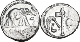 Julius Caesar. AR Denarius, mint moving with Caesar, 49-48 BC. Obv. Elephant advancing right, trampling on horned serpent; in exergue, CAESAR. Rev. Po...