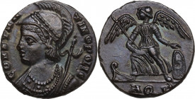 Commemorative series. Struck under Constantine I. AE Follis, Aquileia mint, 334-335 AD. Obv. CONSTANTINOPOLIS. Laureate, helmeted, and draped bust of ...