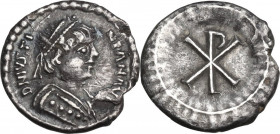 Justinian I (527-565). AR Half Siliqua, Ravenna mint, 552-565 AD. Obv. DN IVSTINIANVS. Diademed and mantled bust right. Rev. Large Christogram within ...