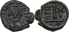 Heraclius (610-641). AE Decanummium. Catania mint. Dated RY 11 (620/1 AD). Obv. [HER]ACLIVS PP AV. Crowned, draped and cuirassed bust facing, holding ...
