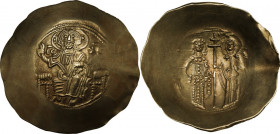 Manuel I Comnenus (1143-1180). EL Aspron Trachy, Constantinople mint. Obv. Christ, seated facing on throne without back, raising right hand in benedic...