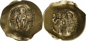 Manuel I Comnenus (1143-1180). EL Aspron Trachy, Constantinople mint. Obv. Christ, seated facing on throne with back, holding book of Gospels. Rev. Th...