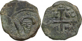 Antioch. Tancred, Regent (1101-1103, 1104-1112). AE Follis. D/ Bust of Tancred wearing turban and holding sword in right hand. R/ Ornate cross; IC - X...