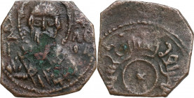 Bari. Ruggero II (1105-1154). Follaro o mezzo follaro, datato 534 AH (1139-1140). D/ Busto frontale di San Nicola con omophorion; ai lati, Θα NI-KAOA ...