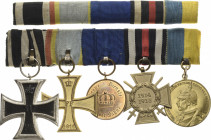 Ordensspangen
Spange mit 5 Auszeichnungen Preußen - Eisernes Kreuz 1914, 2. Klasse. Mecklenburg-Schwerin - Militärverdienstkreuz 1914, 2. Klasse am B...